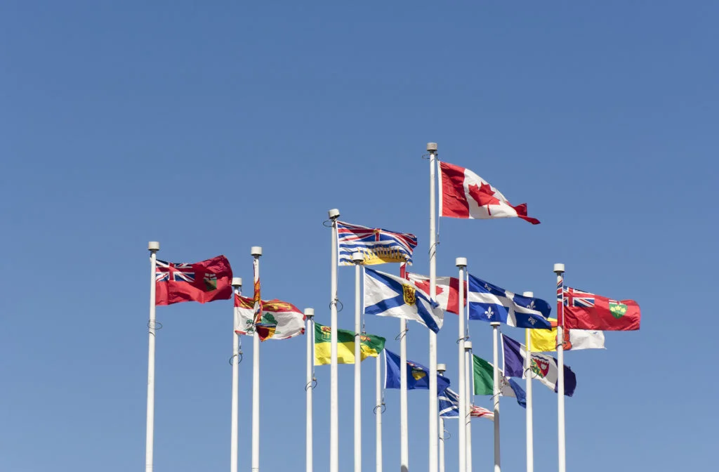 Canadian provincial flags representing Provincial Nominee Program draws